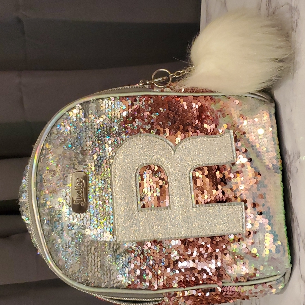 JUSTICE FLIP SEQUENCE BOOKBAG WITH WHITE ZIPPER PUFF